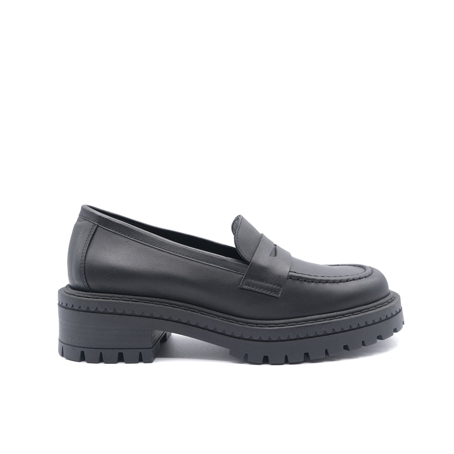 Black loafer shoe on a white background