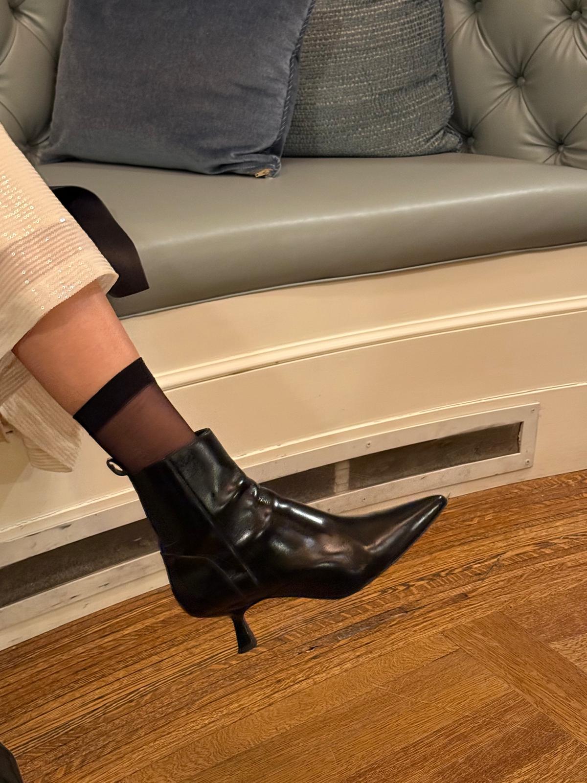 The Party Favor Heeled Bootie Black Leather